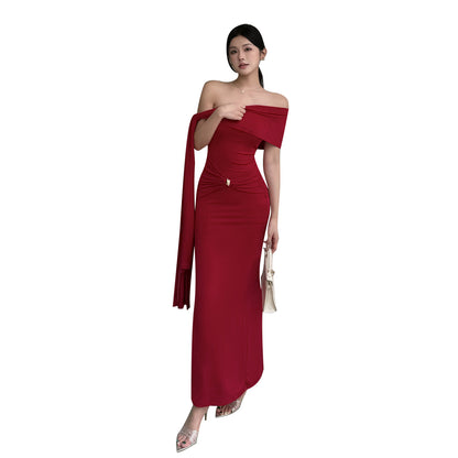 Waist tied dress with slanted shoulders and exposed shoulders