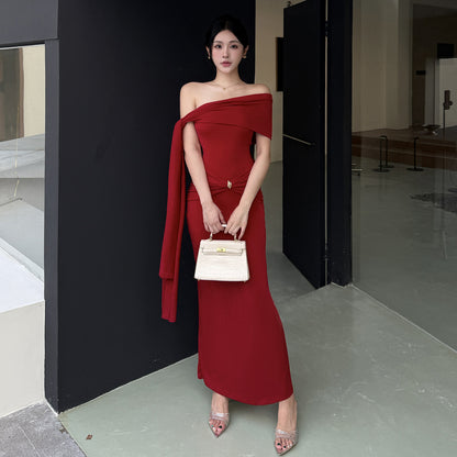 Waist tied dress with slanted shoulders and exposed shoulders